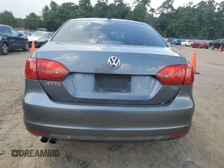 2014 Volkswagen Jetta TDI w/Premium with VIN 3VWLL7AJ4EM374570, listed as a Copart auction lot 63996195 with 186,497 mi miles and Salvage title. Bid and sale history available at DreamBid. Image 6.