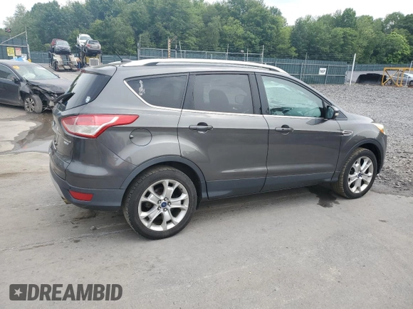 2016 Ford Escape Titanium with VIN 1FMCU9J90GUA01974, listed as a Copart auction lot 60376265 with 177,384 mi miles and Salvage title. Bid and sale history available at DreamBid. Image 3.
