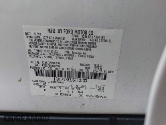 2018 Ford Taurus SEL with VIN 1FAHP2E82JG113133, listed as a IAAI auction lot 41240201 with 146,015 mi miles. Bid and sale history available at carsss.com. Image 9.