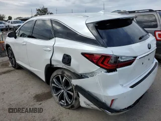 2022 Lexus RX with VIN JTJHZKEA5N2027824, listed as a Copart auction lot 71738562 with 5,100 mi miles. Bid and sale history available at carsss.com. Image 2.