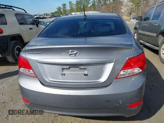 2014 Hyundai Accent GLS with VIN KMHCT4AEXEU710606, listed as a IAAI auction lot 41764163 with 103,859 mi miles. Bid and sale history available at carsss.com. Image 16.