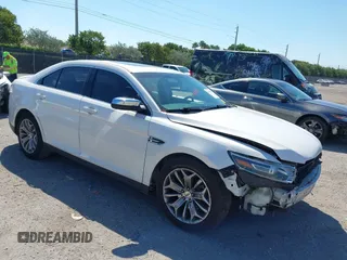 2016 Ford Taurus Limited with VIN 1FAHP2F88GG109434, listed as a IAAI auction lot 41894027 with 220,313 mi miles and . Bid and sale history available at carsss.com. Image 1.