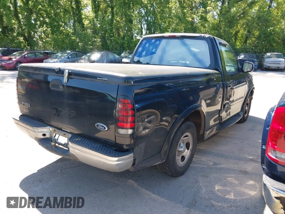 2000 Ford F-150 XL with VIN 1FTRF17L6YKA00872, listed as a IAAI auction lot 42195407 with 210,209 mi miles and . Bid and sale history available at DreamBid. Image 4.