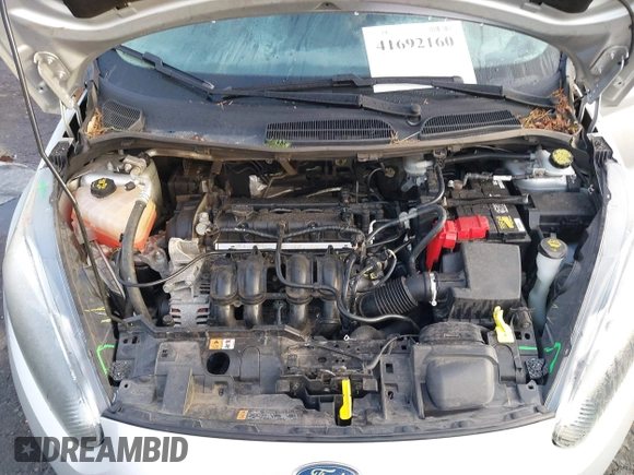 2019 Ford Fiesta SE z VIN 3FADP4EJ7KM147864, wystawiony jako IAAI lot #41692160 z przebiegiem 87 417 mil mil oraz . Historia ofert i sprzedaży dostępna na DreamBid. Obrazek 10.