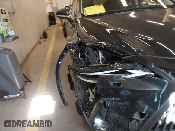 2022 Lexus NX 450h+ Luxury z VIN JTJHKCFZ7N2003572, wystawiony jako IAAI lot #42101154 z przebiegiem 34 455 mil mil oraz . Historia ofert i sprzedaży dostępna na DreamBid. Obrazek 6.