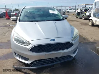 2016 Ford Focus SE with VIN 1FADP3K24GL254645, listed as a IAAI auction lot 41725276 with 117,645 mi miles. Bid and sale history available at carsss.com. Image 12.