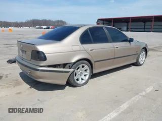 2000 BMW 5 Series 528i with VIN WBADM6348YGV00883, listed as a IAAI auction lot 41898075 with 175,137 mi miles and . Bid and sale history available at DreamBid. Image 4.