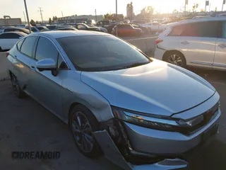 2018 Honda Clarity z VIN JHMZC5F15JC018312, wystawiony jako IAAI lot #41354648 z przebiegiem 97 035 mil mil oraz . Historia ofert i sprzedaży dostępna na DreamBid. Obrazek 1.