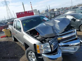 2013 Chevrolet Silverado 1500 LT with VIN 1GCRCSE06DZ274985, listed as a IAAI auction lot 41824879 with 64,721 mi miles. Bid and sale history available at carsss.com. Image 6.