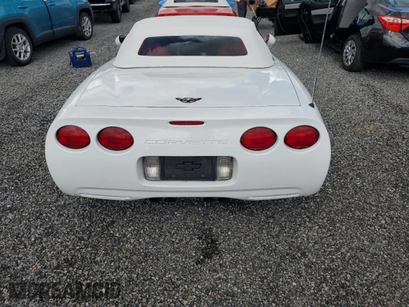 2000 Chevrolet Corvette with VIN 1G1YY32G3Y5104593, listed as a Copart auction lot 74254424 with 54,522 mi miles and Salvage Title. Bid and sale history available at carsss.com. Image 6.