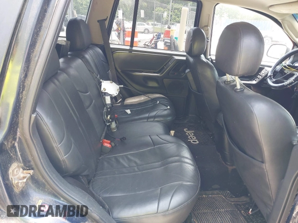 2004 Jeep Grand Cherokee with VIN 1J8GW48N94C135866, listed as a IAAI auction lot 42419888 with 326,880 mi miles and . Bid and sale history available at DreamBid. Image 8.