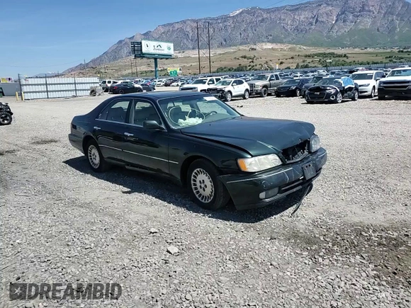 1999 Infiniti Q45 z VIN JNKBY31A6XM600579, wystawiony jako Copart lot #57683075 z przebiegiem 215 415 mil mil oraz Szkoda całkowita • Salvage title. Historia ofert i sprzedaży dostępna na DreamBid. Obrazek 14.