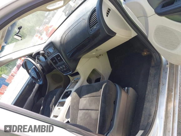2012 Dodge Grand Caravan SXT with VIN 2C4RDGCG0CR284124, listed as a IAAI auction lot 42103224 with 131,691 mi miles and . Bid and sale history available at DreamBid. Image 5.