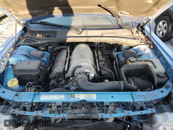 2010 Dodge Challenger SRT-8 with VIN 2B3CJ7DW7AH130521, listed as a Copart auction lot 88990235 with 128,370 mi miles and Salvage title. Bid and sale history available at DreamBid. Image 11.