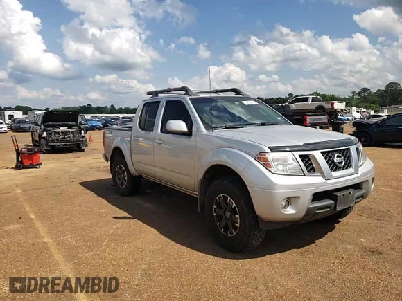 2016 Nissan Frontier Pro-4X with VIN 1N6AD0EV0GN797437, listed as a Copart auction lot 54203245 with 131,021 mi miles and Salvage title. Bid and sale history available at DreamBid. Image 13.