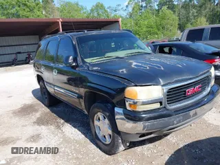 2004 GMC Yukon SLT with VIN 1GKEC13Z44J328264, listed as a IAAI auction lot 41993825 with 267,247 mi miles. Bid and sale history available at carsss.com. Image 1.