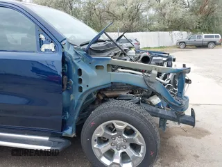 2019 Ram 1500 Big Horn/Lone Star with VIN 1C6SRFFT7KN663677, listed as a IAAI auction lot 40325088 with 77,035 mi miles. Bid and sale history available at carsss.com. Image 20.