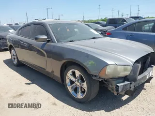 2012 Dodge Charger SE with VIN 2C3CDXBG5CH219805, listed as a IAAI auction lot 42002071 with 238,820 mi miles. Bid and sale history available at carsss.com. Image 1.