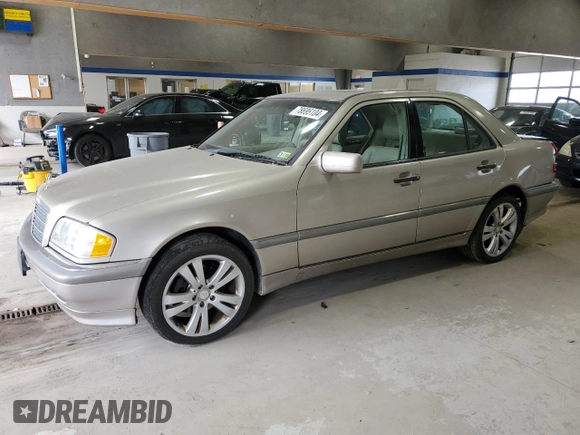 1999 Mercedes-Benz C 230/260/280/320 with VIN WDBHA24G7XA740618, listed as a Copart auction lot 78695104 with 144,512 mi miles and Salvage Title. Bid and sale history available at carsss.com. Image 1.