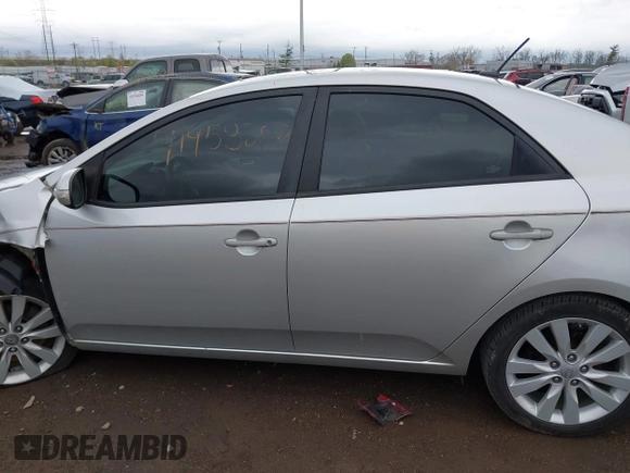 2010 Kia Forte SX with VIN KNAFW4A39A5230517, listed as a IAAI auction lot 41953297 with 154,711 mi miles. Bid and sale history available at carsss.com. Image 15.