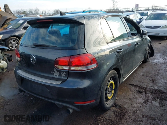 2010 Volkswagen GTI with VIN WVWHV7AJ5AW086277, listed as a IAAI auction lot 41753354 with 192,788 mi miles. Bid and sale history available at carsss.com. Image 4.