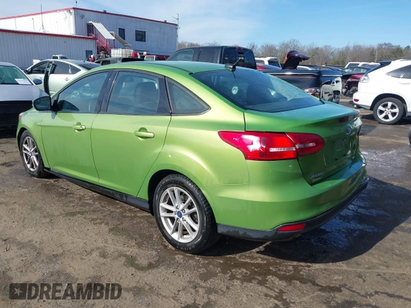 2018 Ford Focus SE with VIN 1FADP3FE7JL237818, listed as a IAAI auction lot 41729205 with 66,702 mi miles. Bid and sale history available at carsss.com. Image 3.