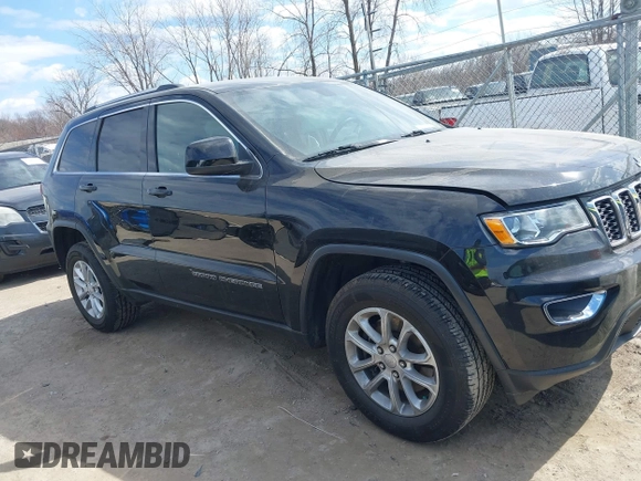 2021 Jeep Grand Cherokee Laredo X with VIN 1C4RJFAG7MC502866, listed as a IAAI auction lot 41841328 with 59,870 mi miles and . Bid and sale history available at DreamBid. Image 13.