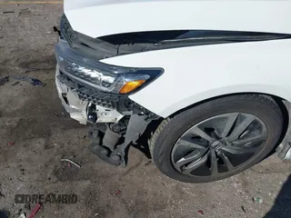 2020 Honda Accord with VIN 1HGCV3F16LA015232, listed as a IAAI auction lot 41633260 with 244,855 mi miles and . Bid and sale history available at DreamBid. Image 6.