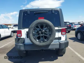 2017 Jeep Wrangler Unlimited Sport with VIN 1C4BJWDG6HL711082, listed as a IAAI auction lot 42036092 with 52,400 mi miles. Bid and sale history available at carsss.com. Image 16.