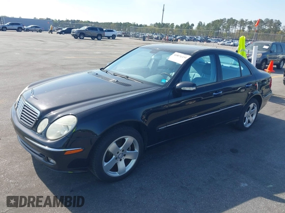 2003 Mercedes-Benz E-Class 3.2L with VIN WDBUF65J33A112308, listed as a IAAI auction lot 41871334 with 138,522 mi miles. Bid and sale history available at carsss.com. Image 2.