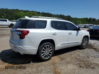 2023 GMC Acadia Denali with VIN 1GKKNPLS6PZ166825, listed as a Copart auction lot 52441385 with 28,864 mi miles and Salvage title. Bid and sale history available at DreamBid. Image 3.