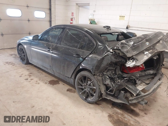 2013 BMW 3 Series 328i xDrive with VIN WBA3B5G57DNS02815, listed as a IAAI auction lot 41643602 with 162,895 mi miles. Bid and sale history available at carsss.com. Image 3.