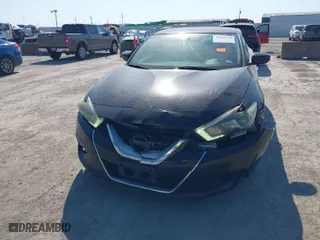 2016 Nissan Maxima 3.5 Platinum with VIN 1N4AA6AP1GC392064, listed as a IAAI auction lot 40609252 with 143,064 mi miles. Bid and sale history available at carsss.com. Image 6.