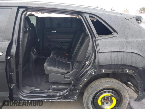 2022 Volkswagen Atlas SE z VIN 1V2WE2CA3NC203707, wystawiony jako IAAI lot #41720912 z przebiegiem 50 572 mil mil oraz . Historia ofert i sprzedaży dostępna na DreamBid. Obrazek 6.