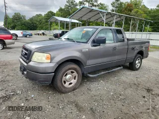 2005 Ford F-150 STX with VIN 1FTRX12W55FB32573, listed as a Copart auction lot 59602715 with 238,701 mi miles and Salvage title. Bid and sale history available at DreamBid. Image 1.