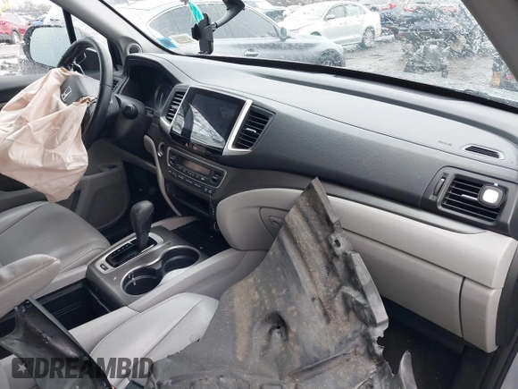 2017 Honda Pilot EX-L with VIN 5FNYF6H51HB069068, listed as a IAAI auction lot 41567728 with 100,618 mi miles and . Bid and sale history available at DreamBid. Image 5.