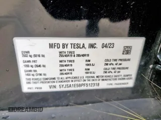2023 Tesla Model S with VIN 5YJSA1E59PF512318, listed as a Copart auction lot 58377895 with 34,402 mi miles and Salvage title. Bid and sale history available at DreamBid. Image 12.