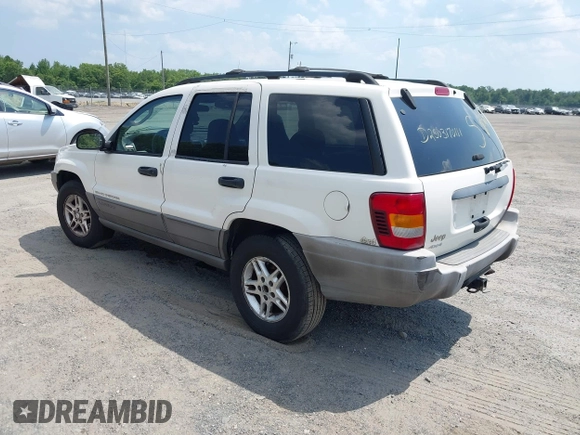 2003 Jeep Grand Cherokee Laredo with VIN 1J4GW48S73C605561, listed as a IAAI auction lot 42424407 with Not provided miles and . Bid and sale history available at DreamBid. Image 3.