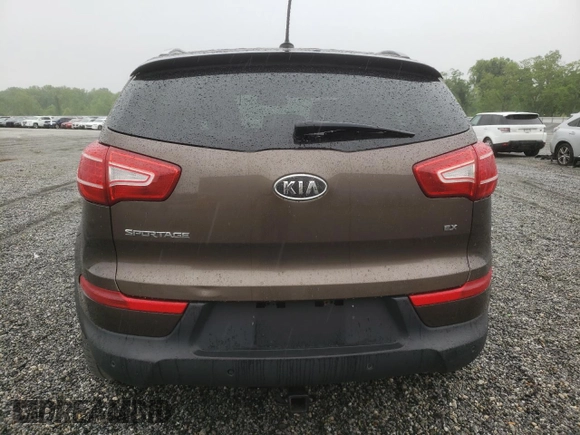 2011 Kia Sportage EX with VIN KNDPC3A2XB7080957, listed as a Copart auction lot 54665855 with 191,076 mi miles and Salvage title. Bid and sale history available at DreamBid. Image 6.