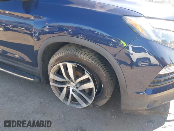 2017 Honda Pilot Touring with VIN 5FNYF6H98HB020341, listed as a IAAI auction lot 42037156 with 73,511 mi miles and . Bid and sale history available at DreamBid. Image 6.