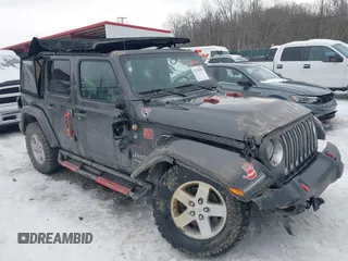 2019 Jeep Wrangler Unlimited Sahara with VIN 1C4HJXEG7KW640608, listed as a IAAI auction lot 41339391 with 57,556 mi miles and . Bid and sale history available at DreamBid. Image 1.