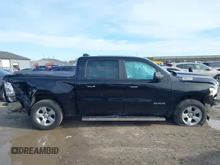 2019 Ram 1500 Big Horn z VIN 1C6SRFFT7KN658334, wystawiony jako IAAI lot #41930603 z przebiegiem 84 124 mil mil oraz . Historia ofert i sprzedaży dostępna na DreamBid. Obrazek 13.