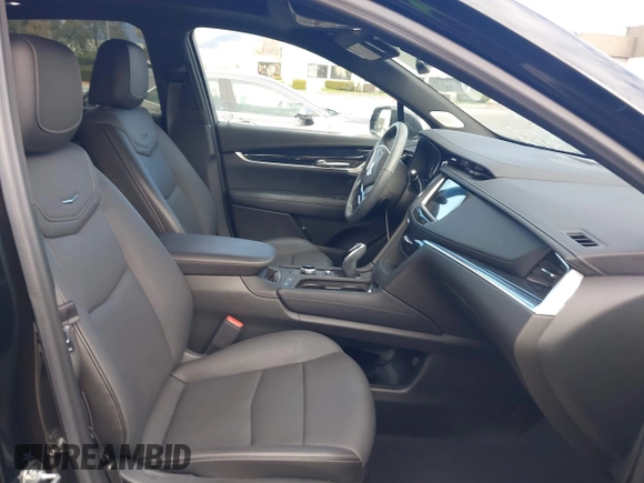 2024 Cadillac XT5 FWD Premium Luxury with VIN 1GYKNCRS6RZ745077, listed as a IAAI auction lot 41247248 with 3,302 mi miles. Bid and sale history available at carsss.com. Image 5.