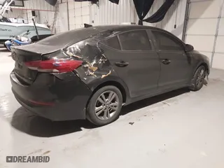 2018 Hyundai Elantra Value Edition with VIN KMHD84LF9JU545086, listed as a IAAI auction lot 41623845 with 128,973 mi miles. Bid and sale history available at carsss.com. Image 4.