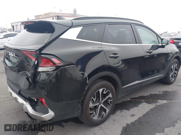 2023 Kia Sportage EX with VIN KNDPVCAG1P7043695, listed as a IAAI auction lot 42505834 with 16,192 mi miles and . Bid and sale history available at DreamBid. Image 4.