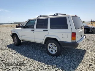 2000 Jeep Cherokee with VIN 1J4FT48S6YL152495, listed as a Copart auction lot 60627965 with 196,086 mi miles and Salvage title. Bid and sale history available at DreamBid. Image 2.