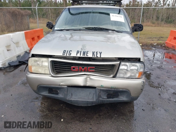 2000 GMC Sonoma SLS z VIN 1GTCS19W1Y8241082, wystawiony jako IAAI lot #41394788 z przebiegiem 193 110 mil mil oraz . Historia ofert i sprzedaży dostępna na DreamBid. Obrazek 6.