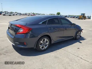 2017 Honda Civic LX z VIN 2HGFC2F55HH523474, wystawiony jako Copart lot #54933425 z przebiegiem 133 036 mil mil oraz Szkoda całkowita • Salvage title. Historia ofert i sprzedaży dostępna na DreamBid. Obrazek 3.
