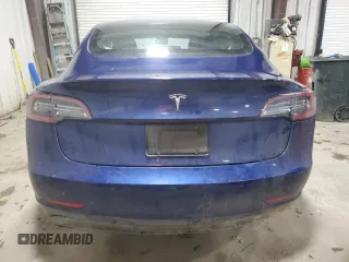 2020 Tesla Model 3 Standard Range Plus with VIN 5YJ3E1EA3LF803784, listed as a Copart auction lot 52881375 with 88,912 mi miles and Salvage Title. Bid and sale history available at DreamBid. Image 6.