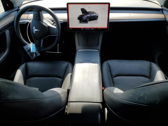 2024 Tesla Model Y Long Range с VIN 7SAYGDEE8RF184146, выставлен на аукционе Copart как лот 61194535 с пробегом 8 225 миль миль и Списание • Salvage title. История ставок и продаж доступна на DreamBid. Изображение 8.